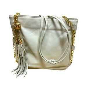 Paris of New York cream butter leather crossbody zipper purse with tassel gold